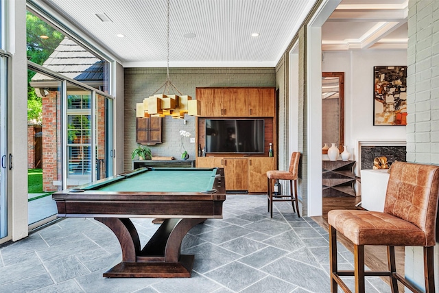 recreation room with stone tile flooring and pool table