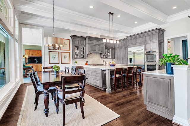 dining area featuring crown molding, recessed lighting, a notable chandelier, and dark wood-style floors