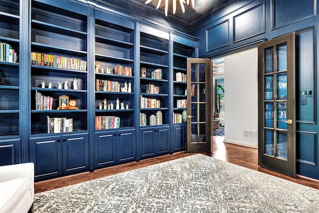 interior space featuring visible vents and dark wood-style floors