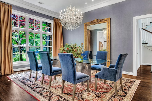 dining area featuring visible vents, crown molding, stairs, wood finished floors, and a chandelier