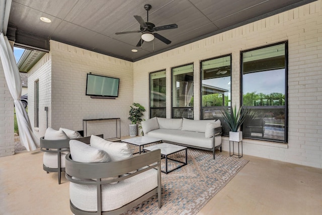 view of patio / terrace with ceiling fan and outdoor lounge area