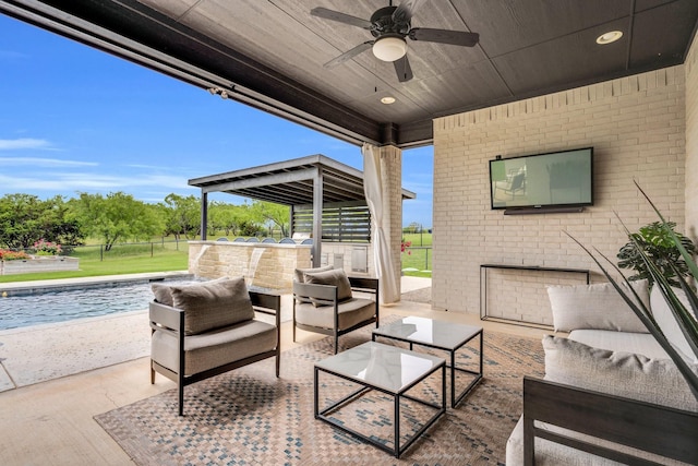 view of patio with an outdoor living space, a ceiling fan, and an outdoor pool