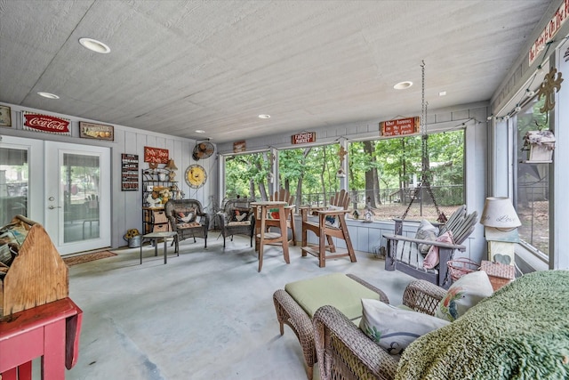 interior space featuring recessed lighting and concrete floors
