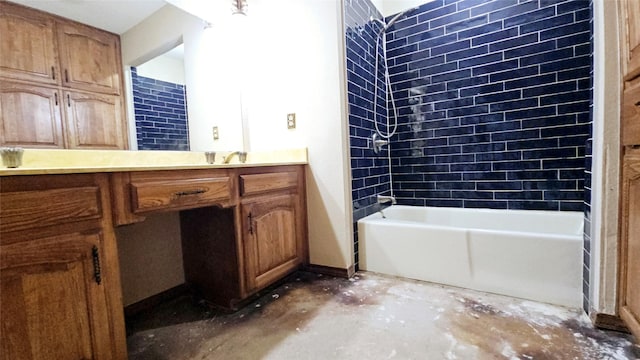 bathroom featuring vanity, unfinished concrete flooring, and tub / shower combination