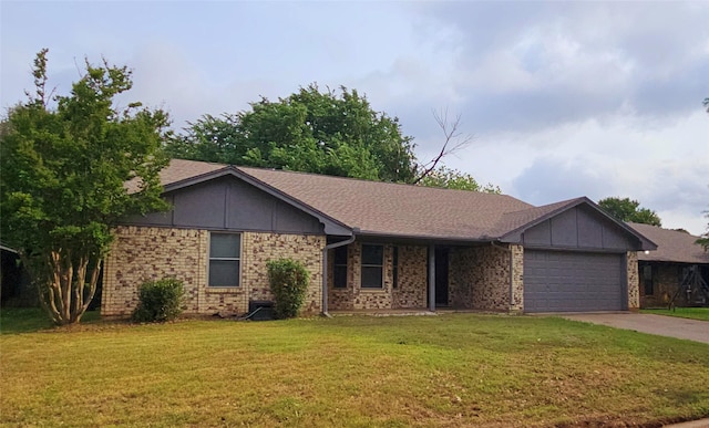 single story home with a garage, driveway, and a front lawn