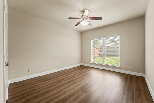 9933 Cottontail Ln, Mckinney, TX 75071 - spare room with baseboards, ceiling fan, and dark wood-style floors