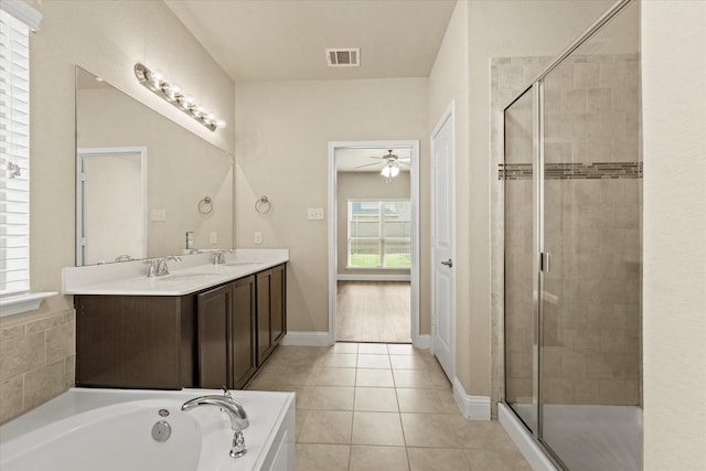 9933 Cottontail Ln, Mckinney, TX 75071 - bathroom featuring a ceiling fan, a stall shower, a bath, and double vanity