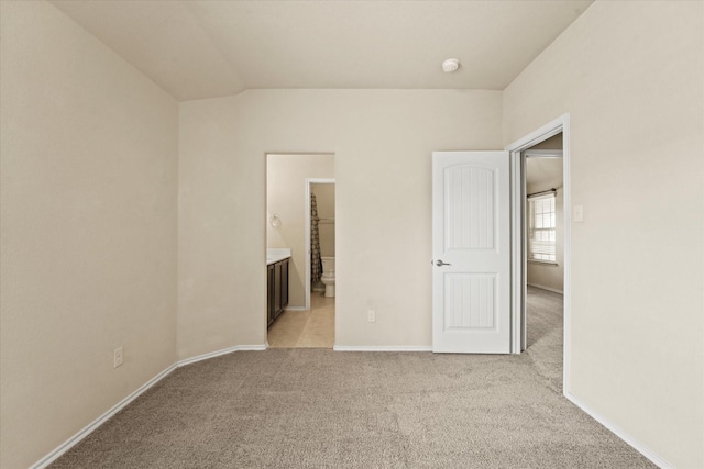 9933 Cottontail Ln, Mckinney, TX 75071 - unfurnished bedroom with light colored carpet, baseboards, and ensuite bathroom