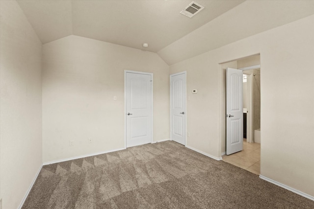 9933 Cottontail Ln, Mckinney, TX 75071 - spare room with carpet flooring, vaulted ceiling, and baseboards