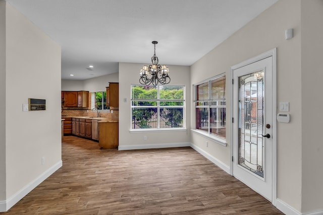 2085 Idlewood Dr, Grapevine, TX 76051 - unfurnished dining area featuring dark wood-style flooring, a chandelier, and recessed lighting