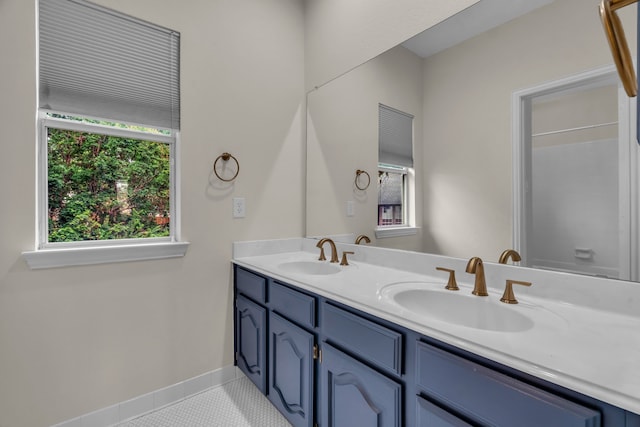 2085 Idlewood Dr, Grapevine, TX 76051 - bathroom with double vanity and tile patterned floors