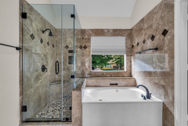 2085 Idlewood Dr, Grapevine, TX 76051 - bathroom with a garden tub, a shower stall, and tile walls