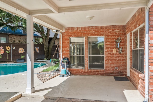 2085 Idlewood Dr, Grapevine, TX 76051 - view of patio with an outdoor pool