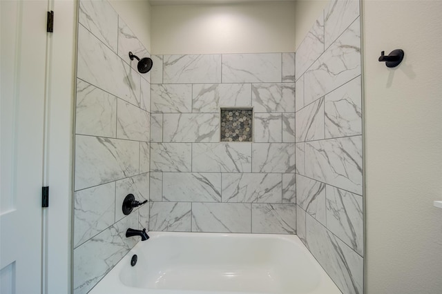 full bath featuring shower / tub combination