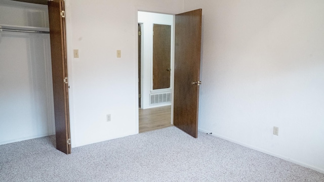 75 Delmore Dr, Hillsboro, TX 76645 - unfurnished bedroom with carpet, a closet, and baseboards