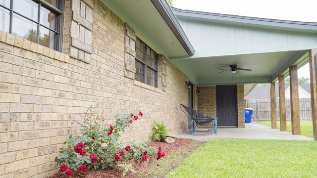 75 Delmore Dr, Hillsboro, TX 76645 - view of property exterior with a ceiling fan, a patio, and brick siding