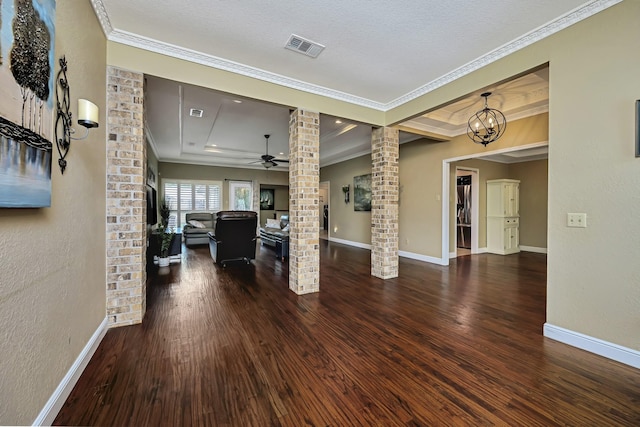 living room with ornate columns, baseboards, ornamental molding, and wood finished floors