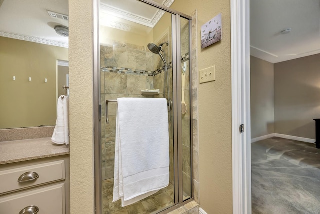 bathroom with visible vents, ornamental molding, and a stall shower