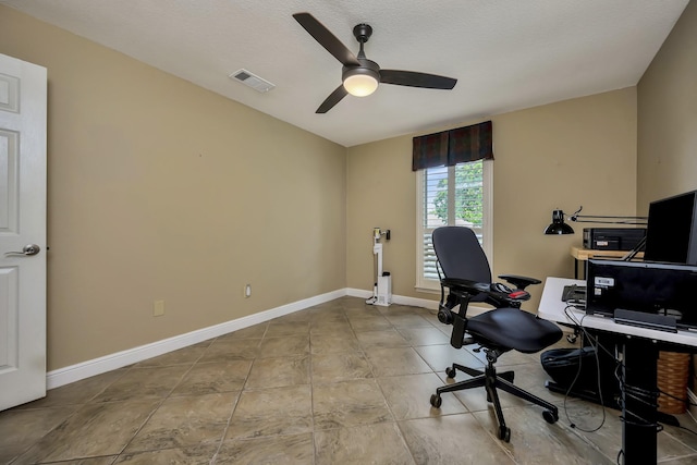 office area with visible vents, baseboards, and ceiling fan