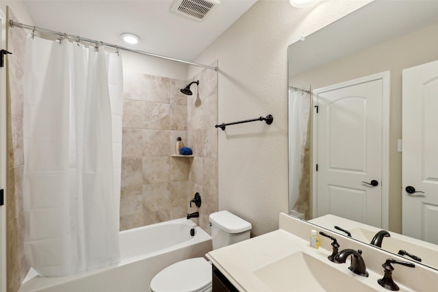 bathroom with toilet, visible vents, shower / bath combination with curtain, and vanity