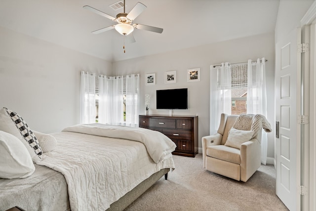 bedroom featuring visible vents, ceiling fan, and light carpet