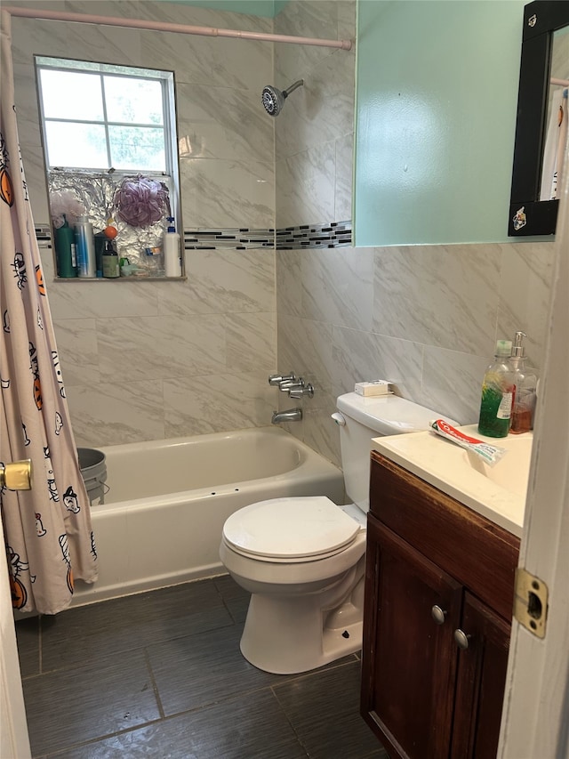 4624 Burma Rd, Dallas, TX 75216 - bathroom with shower / bath combo with shower curtain, vanity, toilet, tile walls, and wood finished floors