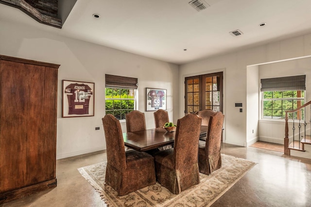 101 Welford Ln, Southlake, TX 76092 - dining space featuring concrete flooring, baseboards, stairs, french doors, and recessed lighting