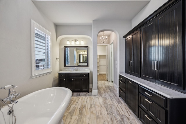 6380 Forefront Ave, Frisco, TX 75036 - full bath with a freestanding tub and vanity