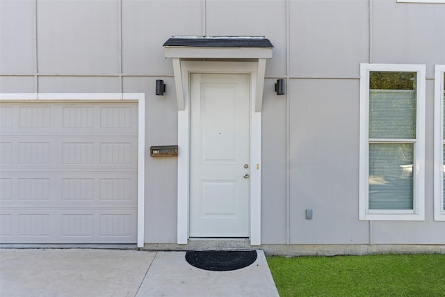 2021 Eva St, Grand Prairie, TX 75051 - view of exterior entry featuring a garage