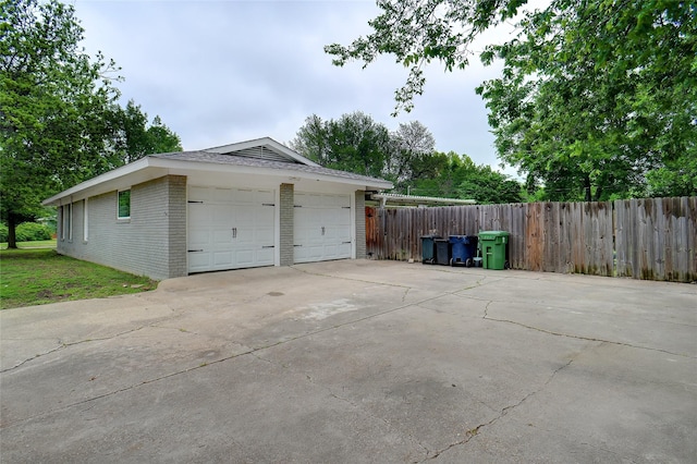 garage featuring fence