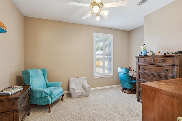 sitting room featuring carpet floors, ceiling fan, baseboards, and visible vents