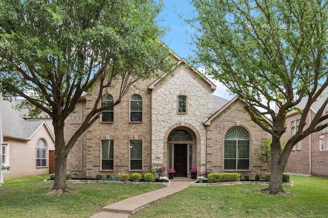 1016 Arches Park Dr, Allen, TX 75013 - view of front of house with brick siding and a front yard