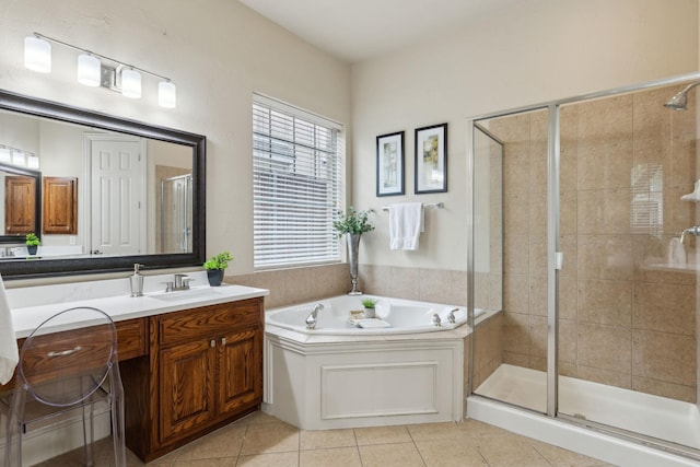 1016 Arches Park Dr, Allen, TX 75013 - bathroom with a shower stall, a garden tub, vanity, and tile patterned flooring