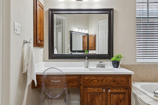 1016 Arches Park Dr, Allen, TX 75013 - bathroom with a garden tub and vanity