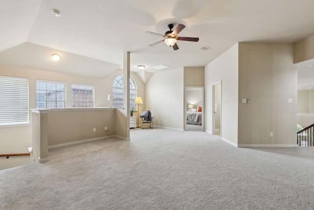1016 Arches Park Dr, Allen, TX 75013 - unfurnished living room with a ceiling fan, vaulted ceiling, carpet, and baseboards