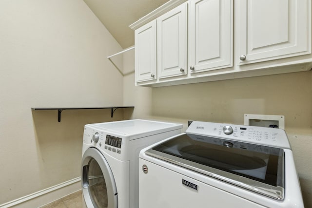 1016 Arches Park Dr, Allen, TX 75013 - clothes washing area featuring washing machine and dryer, cabinet space, baseboards, and light tile patterned floors