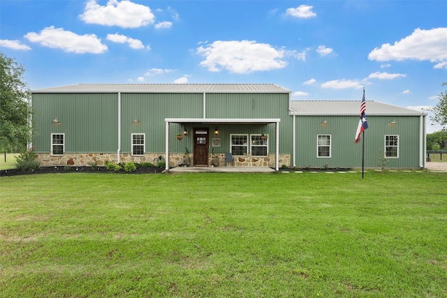 1009 Western Dr, Woodway, TX 76712 - back of property with a lawn, an outbuilding, and metal roof