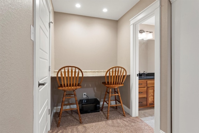 1009 Western Dr, Woodway, TX 76712 - carpeted dining area with recessed lighting, a sink, and baseboards