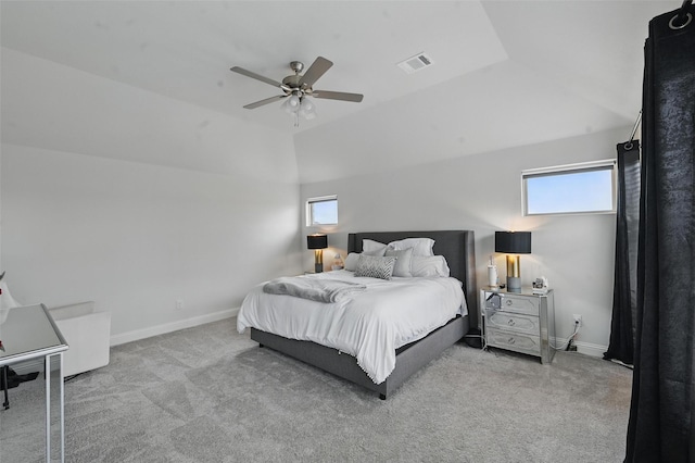 bedroom with baseboards, carpet, lofted ceiling, and visible vents