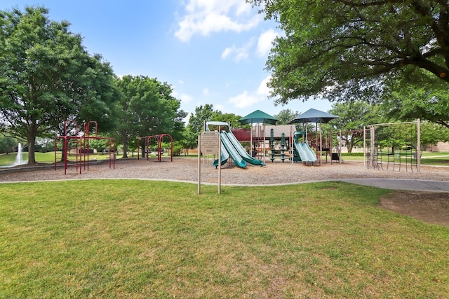 community play area with a lawn