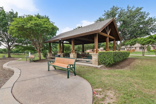 surrounding community featuring a gazebo and a yard