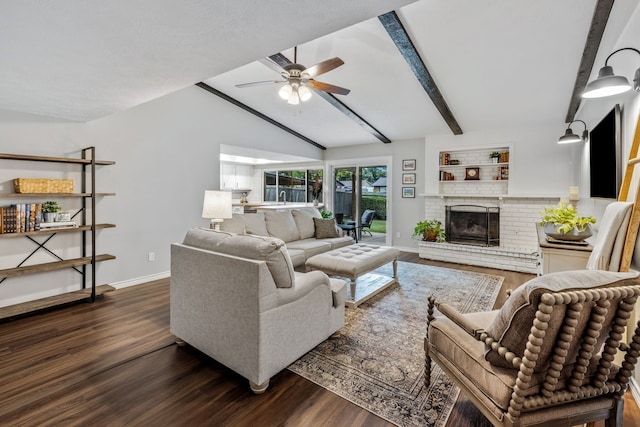 living room with baseboards, vaulted ceiling with beams, a ceiling fan, and wood finished floors