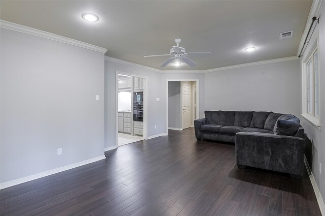 living room with visible vents, dark wood-type flooring, baseboards, and ceiling fan