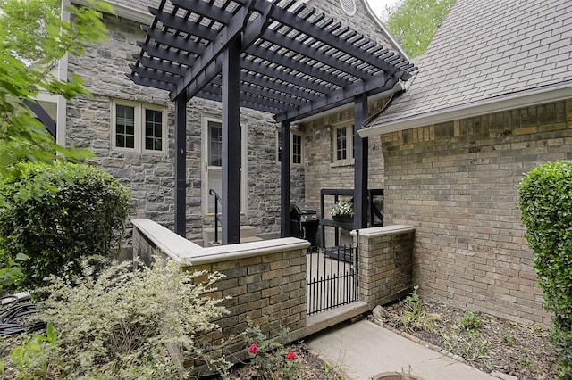 exterior space featuring a pergola and a gate