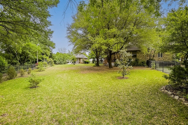 view of yard featuring fence