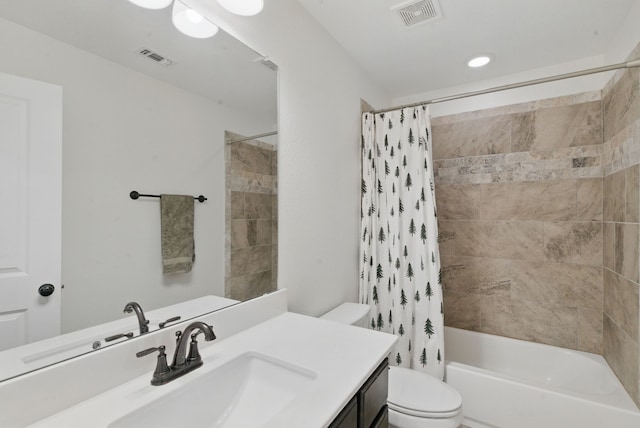 full bath with visible vents, shower / bath combination with curtain, toilet, and vanity