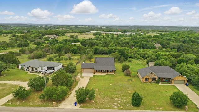 aerial view featuring a forest view