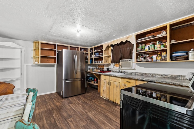 kitchen with freestanding refrigerator, a textured ceiling, open shelves, and dark wood-type flooring
