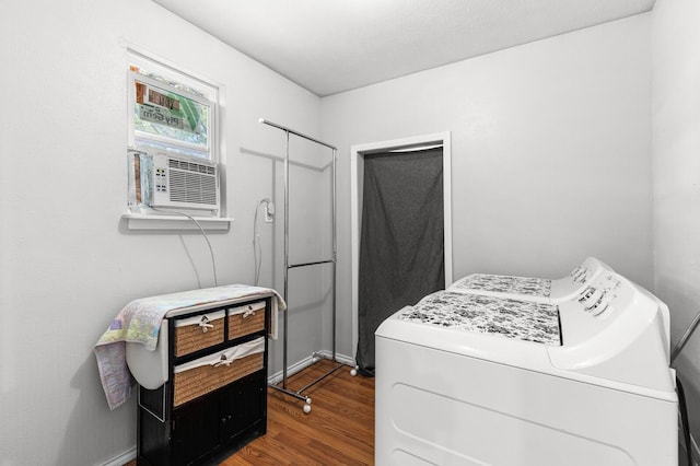 laundry area with laundry area, cooling unit, washer / clothes dryer, and wood finished floors