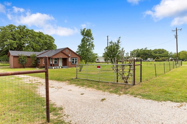 exterior space featuring a lawn, a gate, and fence